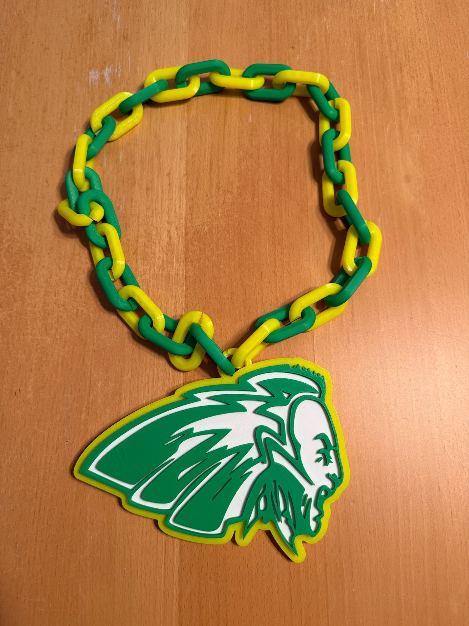 3D-printed IRHS fan pendant on green and yellow chain