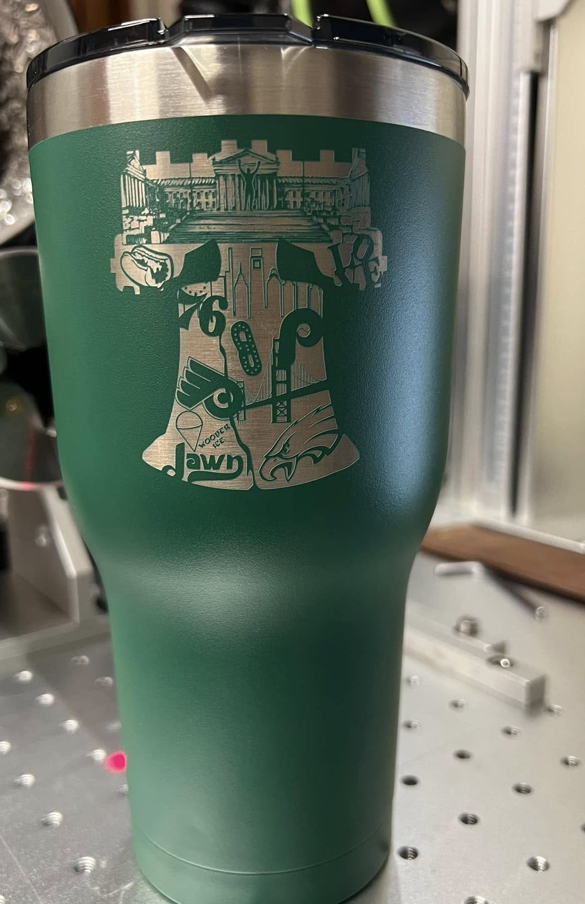 Green tumbler with laser-engraved Philly Liberty Bell collage